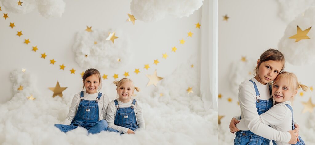 Two sisters posing and having fun in a studio cloud mini session