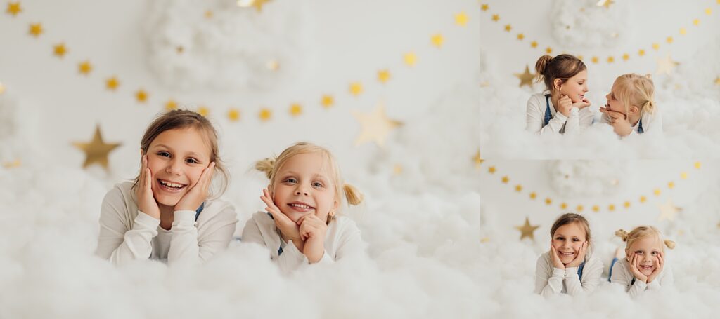 Two giggling sisters capture memories during a fun-filled cloud mini session in the studio.