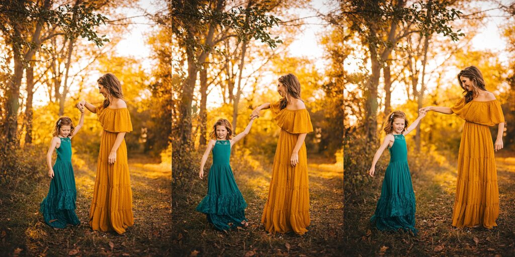 A mom dances with her daughter at sunset during their family session in cedar falls iowa