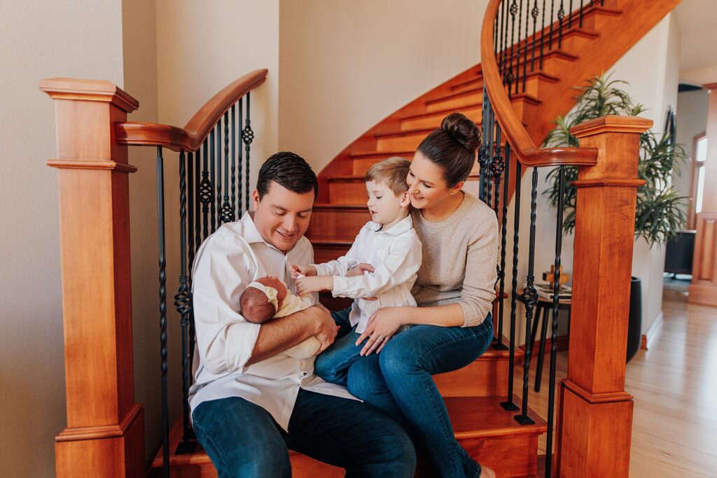 A cozy in-home newborn session capturing a baby peacefully sleeping