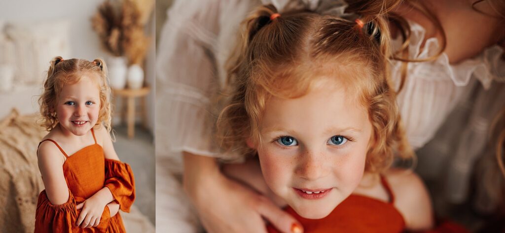 Portrait of a young girl smiling during a motherhood photography session in a Cedar Falls, Iowa studio.