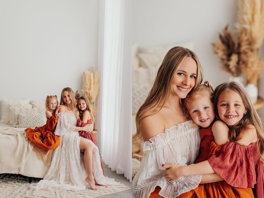 Mother and her two daughters sharing sweet moments during a Mommy and Me session in a Cedar Falls, Iowa studio