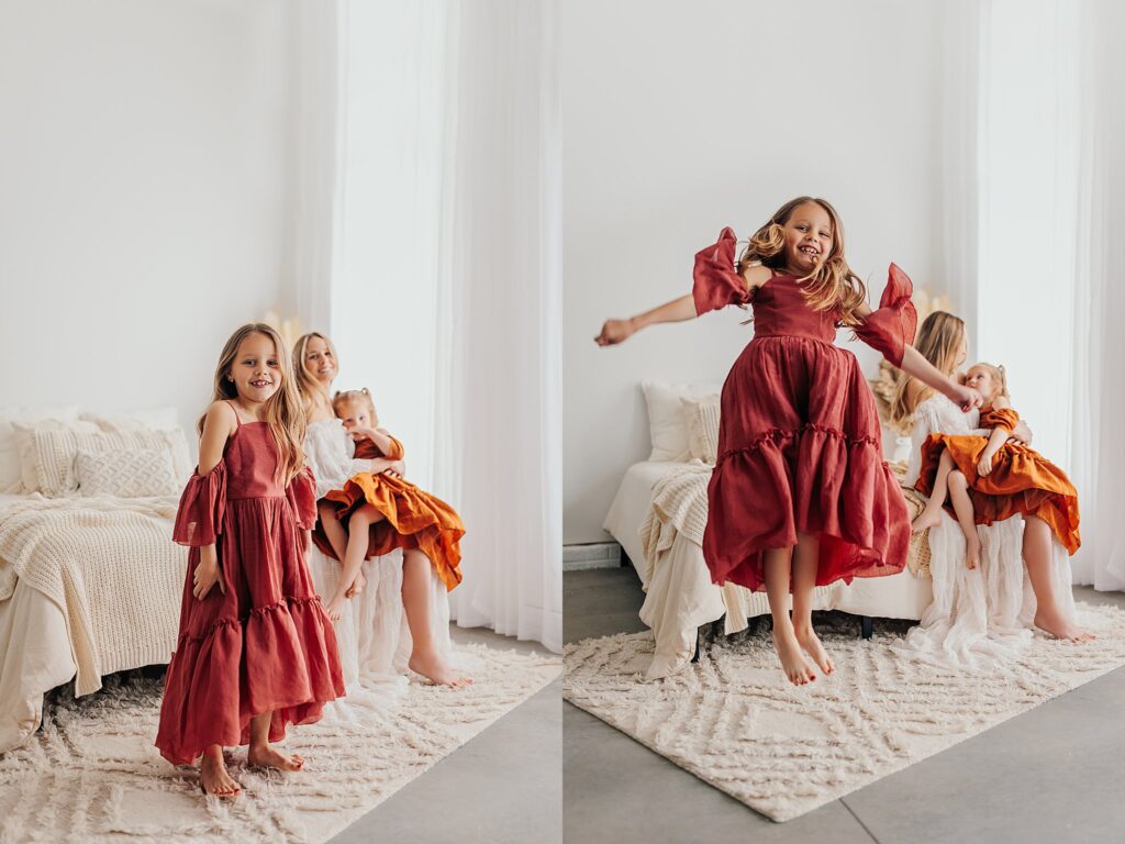 Mother and her two daughters sharing sweet moments during a Mommy and Me session in a Cedar Falls, Iowa studio