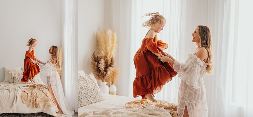 Tender moment between a mother and her daughters, with a mix of solo and sibling shots in a Cedar Falls, Iowa studio one daughter jumping on the bed